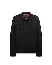 Men's Wayde Twill Overshirt, a black full-zip jacket with a classic fit, two chest flap pockets, a red patterned lining, and a small Psycho Bunny skull logo on the zipper pull. (5)