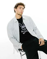 Mens Marc Textured Overshirt in light grey, featuring a full zip, collared design, and small embroidered Psycho Bunny logo on the chest pocket, layered over a black jersey t-shirt with a large white bunny skull graphic.