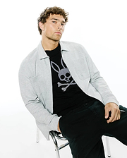 Mens Marc Textured Overshirt in light grey, featuring a full zip, collared design, and small embroidered Psycho Bunny logo on the chest pocket, layered over a black jersey t-shirt with a large white bunny skull graphic.