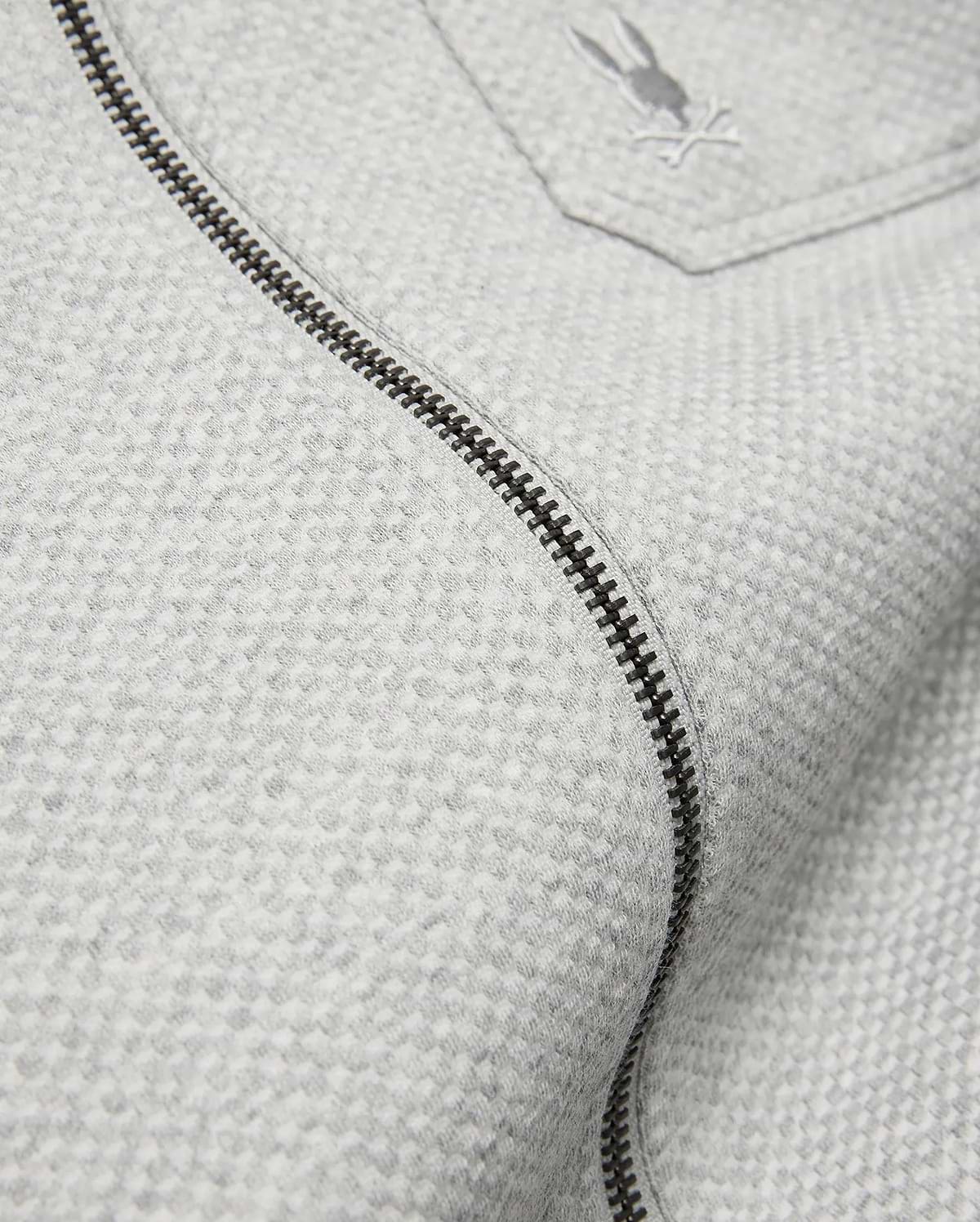 Mens Marc Textured Overshirt in light grey, featuring a subtle textured knit, dark grey full-zip, and a small embroidered Psycho Bunny skull logo on the chest pocket.