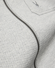 Mens Marc Textured Overshirt in light grey, featuring a subtle textured knit, dark grey full-zip, and a small embroidered Psycho Bunny skull logo on the chest pocket.