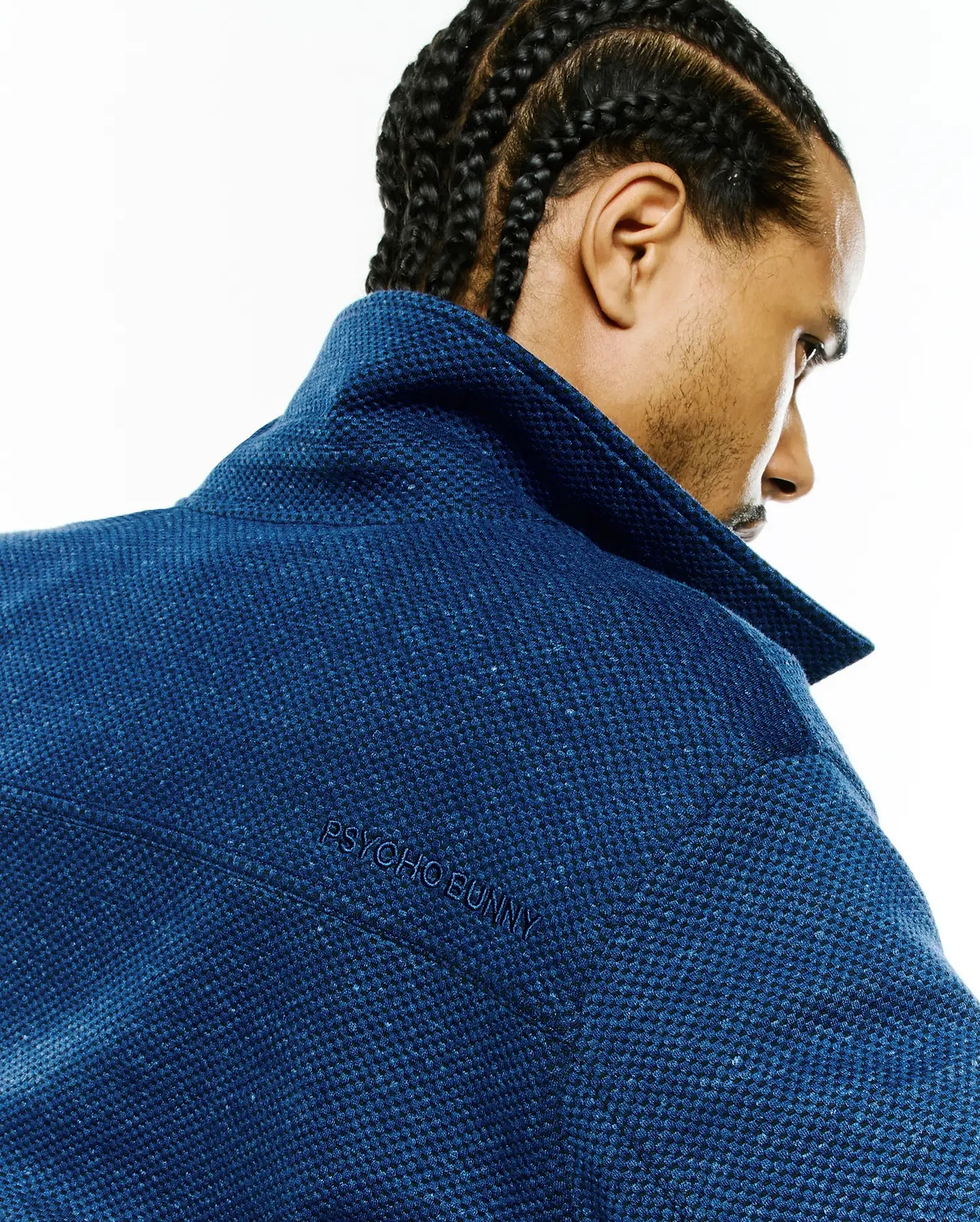 Mens Marc Textured Overshirt, a classic fit deep blue overshirt with a prominent pique-like texture and subtle embroidered PSYCHO BUNNY branding on the upper back.