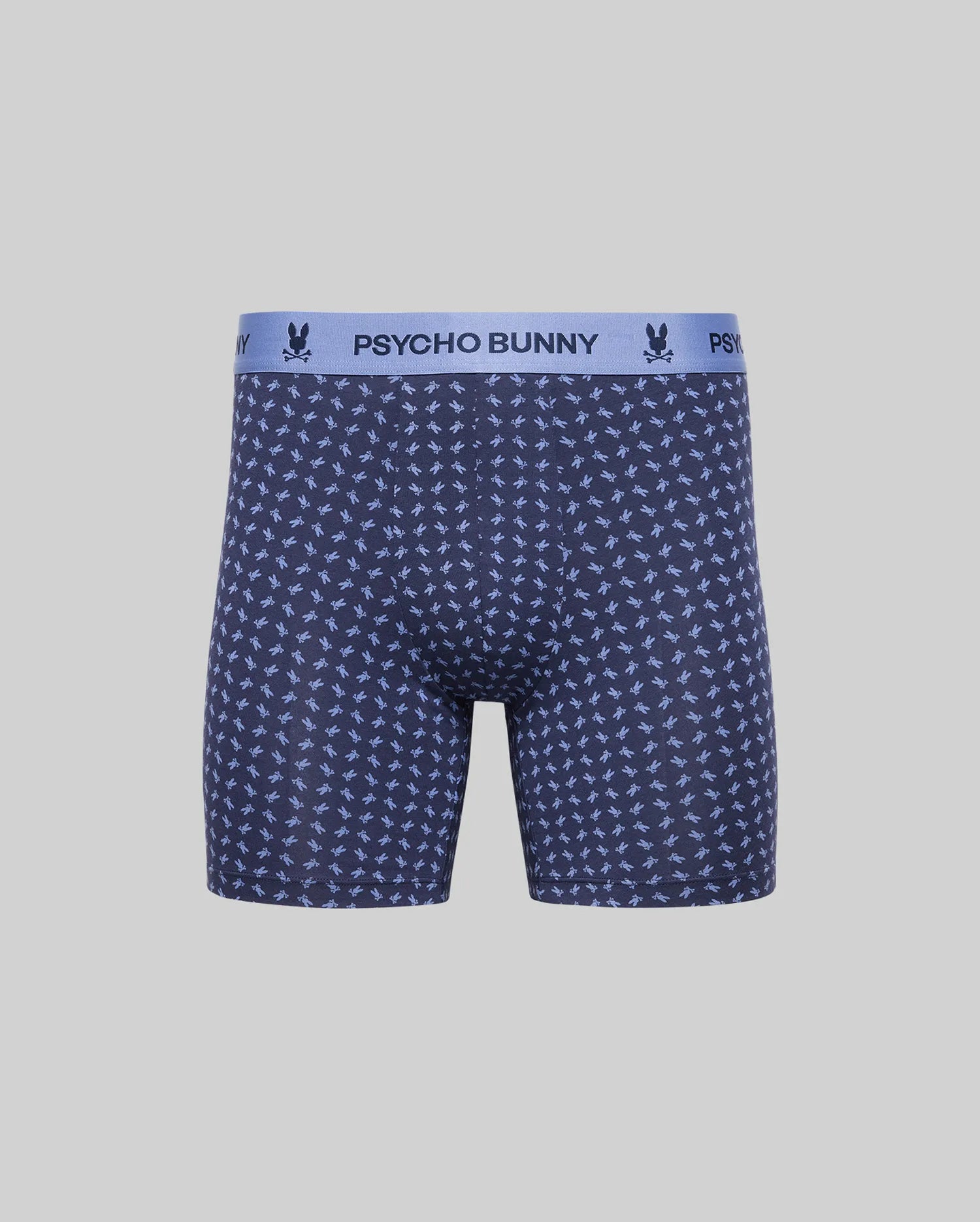 The MENS SINGLE BOXER BRIEF - MO1400010 by Psycho Bunny features breathable navy knit Pima cotton, a light blue "PSYCHO BUNNY" waistband, and a repeating bunny logo pattern for all-day comfort. (4)