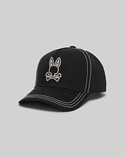 Mens Oscar Trucker Cap in black structured cotton twill, featuring a prominent white embroidered Psycho Bunny skull logo on the front and contrasting white stitching details throughout. (2)