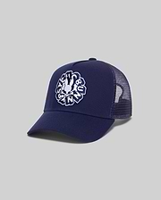 Mens Toby Trucker Cap in navy, featuring a solid front panel and breathable mesh back. A large, centered white embroidered Psycho Bunny skull logo with text adorns the front.