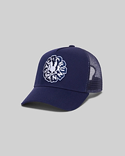 Mens Toby Trucker Cap in navy, featuring a solid front panel and breathable mesh back. A large, centered white embroidered Psycho Bunny skull logo with text adorns the front.
