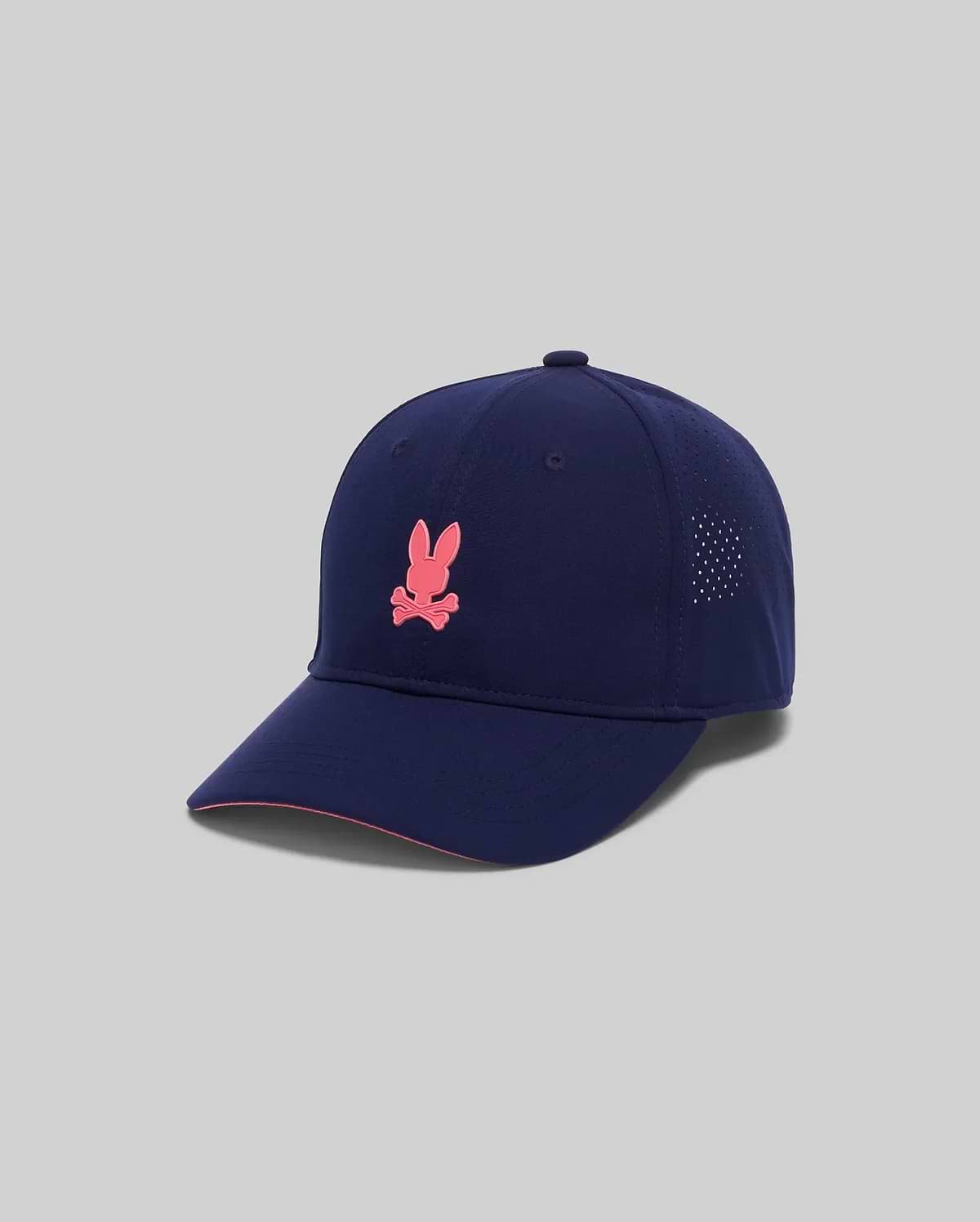Mens Onyx Sport Cap in navy, featuring a prominent pink Psycho Bunny skull logo on the front, perforated side panels, and a pink accent trim on the brim, made from smooth performance fabric. (2)