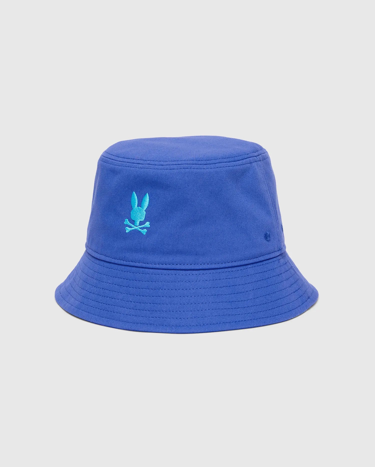 Mens Jimmy Bucket Hat in vibrant royal blue cotton twill, with visible brim stitching and a prominent embroidered turquoise Psycho Bunny skull logo on the front.