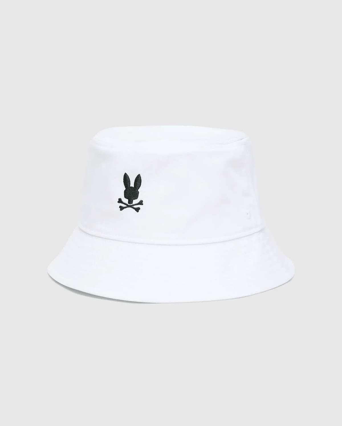 Mens Jimmy Bucket Hat in crisp white cotton twill, featuring a prominent black embroidered Psycho Bunny skull logo centered on the front, with subtle ventilation eyelets.