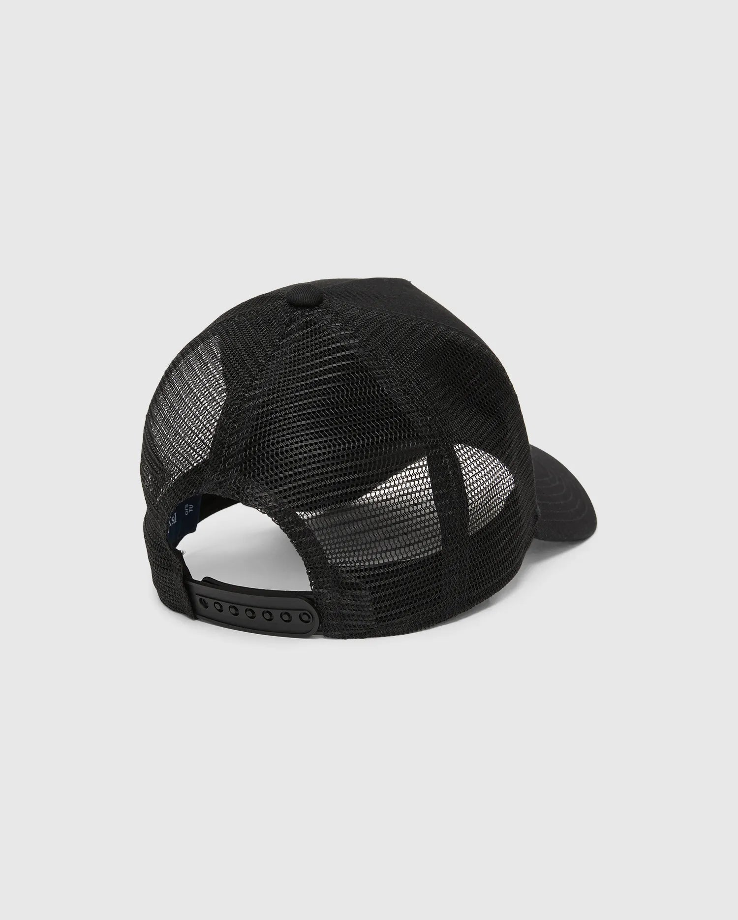 Mens Tobias Trucker Cap, black with breathable mesh back panels, solid front, and an adjustable snapback closure, featuring the iconic Psycho Bunny skull logo.