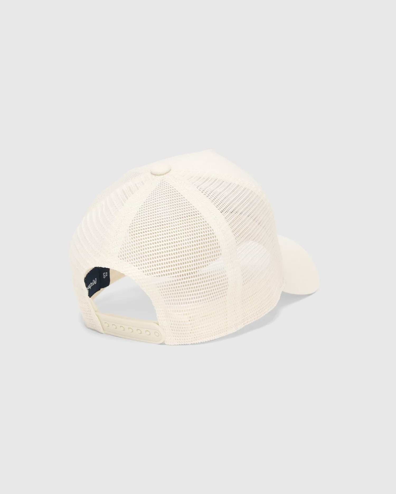 Mens Tobias Trucker Cap in cream, featuring a breathable mesh back, an adjustable snapback closure, and a small navy Psycho Bunny branding tag on the interior.