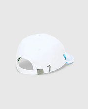 Mens Ray Baseball Cap, white smooth cotton twill with light blue embroidered PB initials on the side panel, concentric lines on the brim, and a metal buckle featuring the Psycho Bunny skull logo.