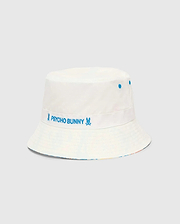 Mens Frank Reversible Bucket Hat, white with blue embroidered Psycho Bunny text and skull logos on a band, blue eyelets, and a subtle multicolor reversible brim.