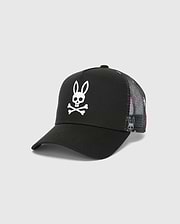 Mens Quintin Trucker Cap featuring a black twill front panel, multicolor patterned mesh back, and a prominent white embroidered Psycho Bunny skull logo.