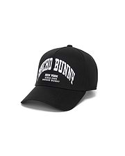 Black Mens Nathaniel A-Frame Trucker Cap featuring large white embroidered arched Psycho Bunny text and smaller New York Since 2005 Psycho Bunny branding on the front.