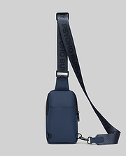 Mens Rubberized Crossbody in deep navy blue with black accents, featuring a smooth rubberized texture and a prominent woven strap displaying repeating Psycho Bunny branding. (3)