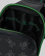 Black Mens Rubberized Crossbody with vibrant green zipper and strap accents, featuring an all-over embossed Psycho Bunny skull logo pattern and a bold green interior text logo. (2)