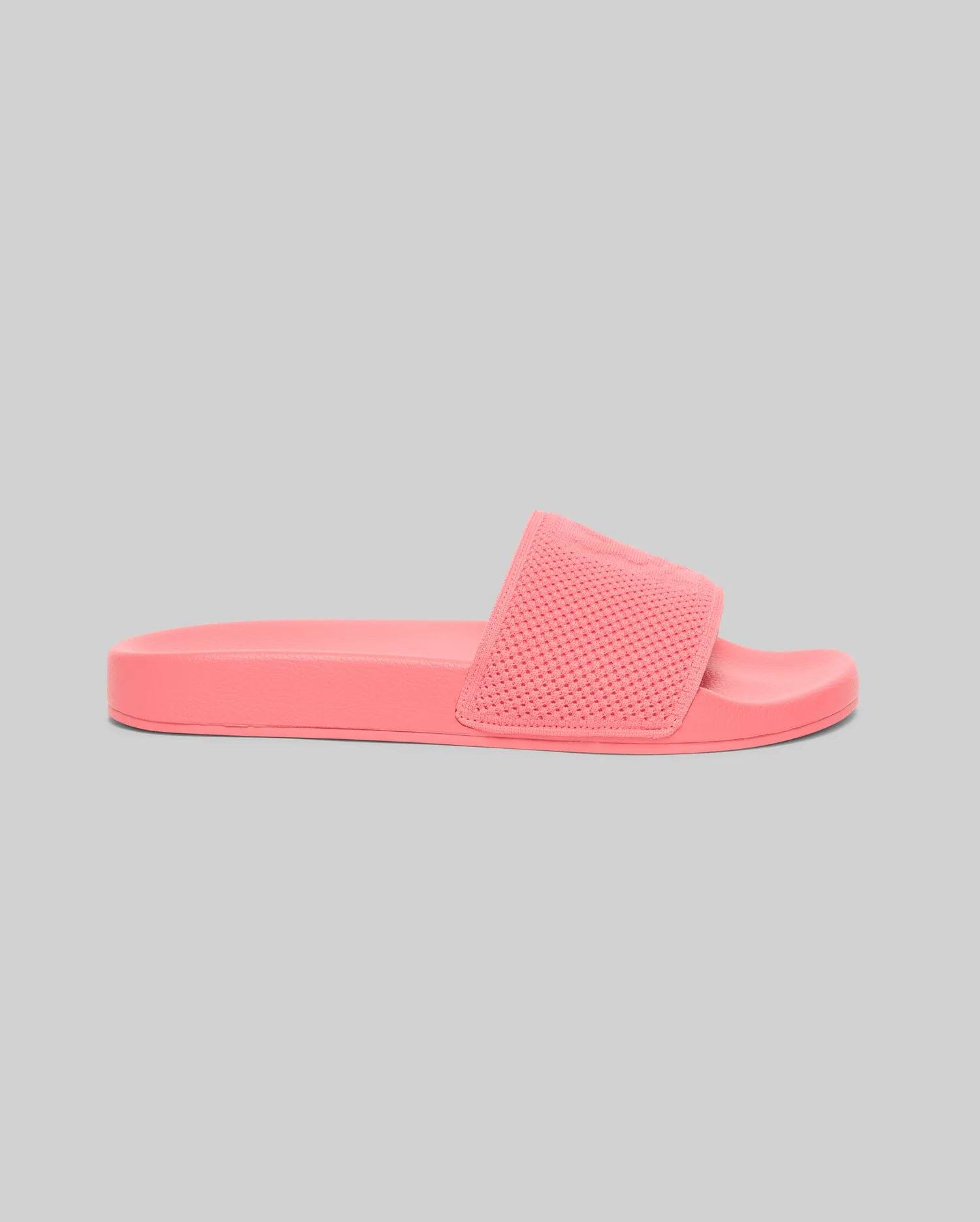 Coral pink Mens Knit Slides featuring a textured knitted upper strap with an embossed Psycho Bunny skull logo and a smooth, contoured sole. (2)