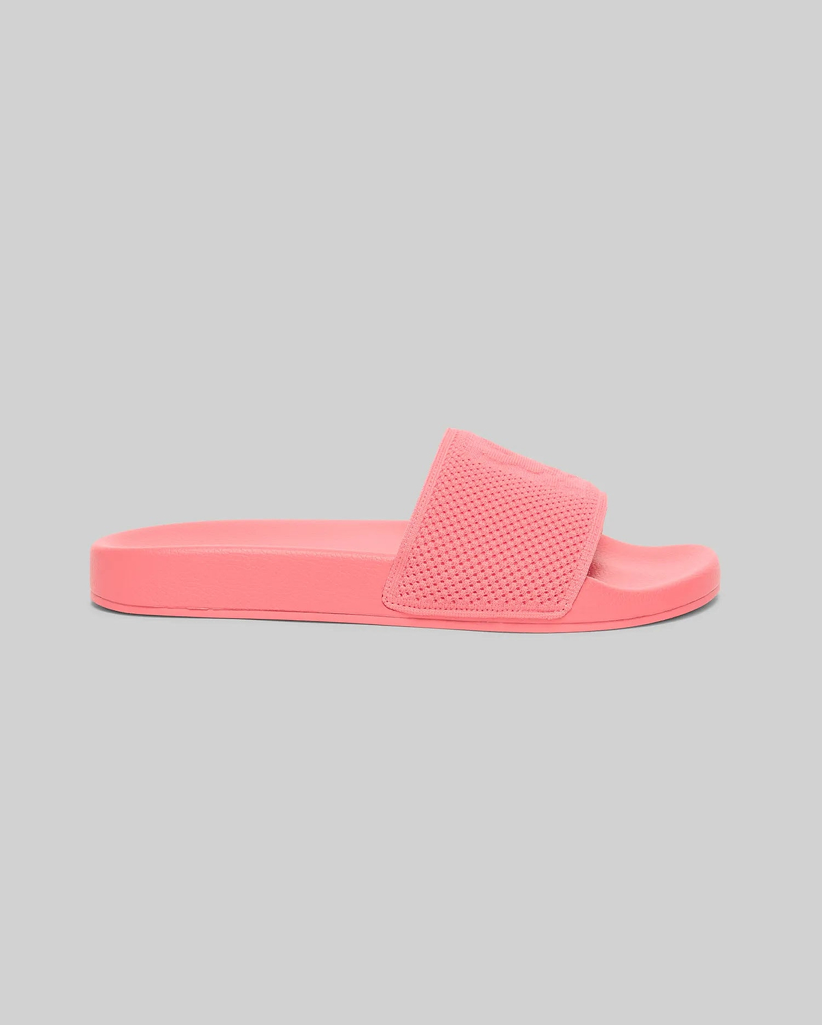 Coral pink Mens Knit Slides featuring a textured knitted upper strap with an embossed Psycho Bunny skull logo and a smooth, contoured sole. (2)