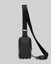 Mens Rubberized Crossbody bag in black, featuring a sleek rubberized finish, white abstract side panel pattern, and a black webbing strap with repeating Psycho Bunny text branding.