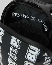 Mens Rubberized Crossbody in black with a white all-over Psycho Bunny text and skull logo print, featuring a rubberized exterior and woven interior lining with repeating branding.