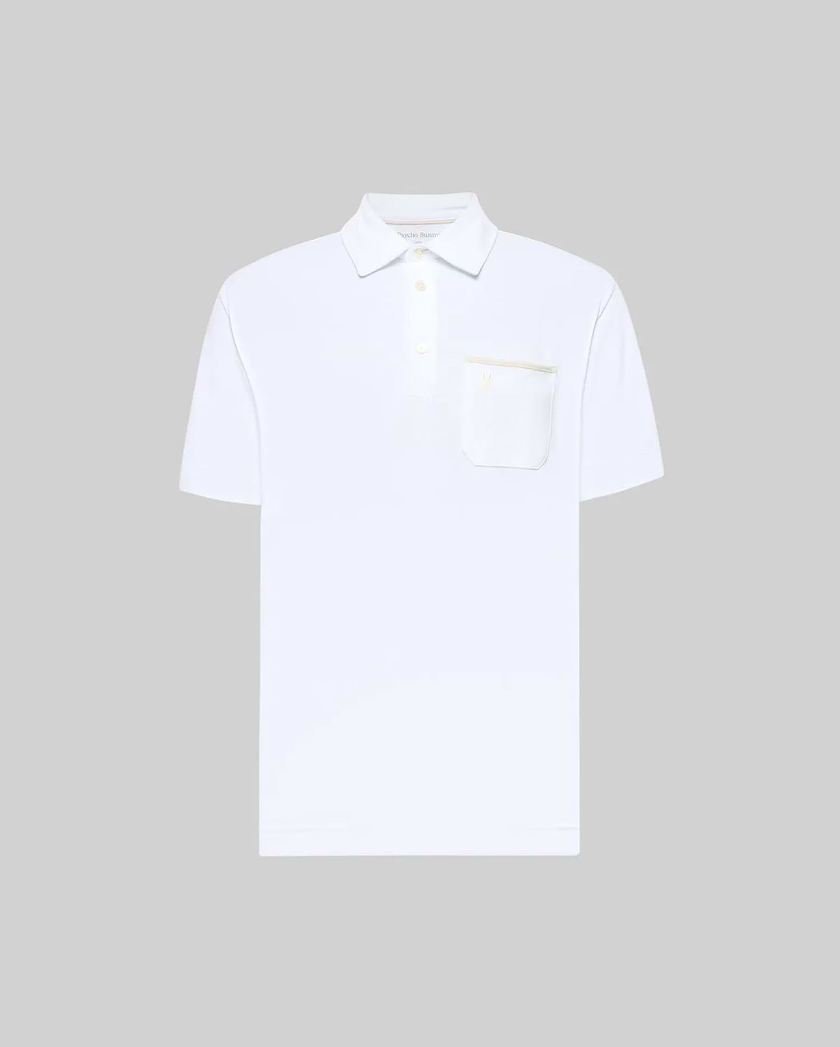 The Psycho Bunny MENS HADLEY PERFORMANCE PIQUE POLO (MT0100021) is a plain white short-sleeve polo with a collar, three buttons, and a left chest pocket, shown against a light gray background. (5)
