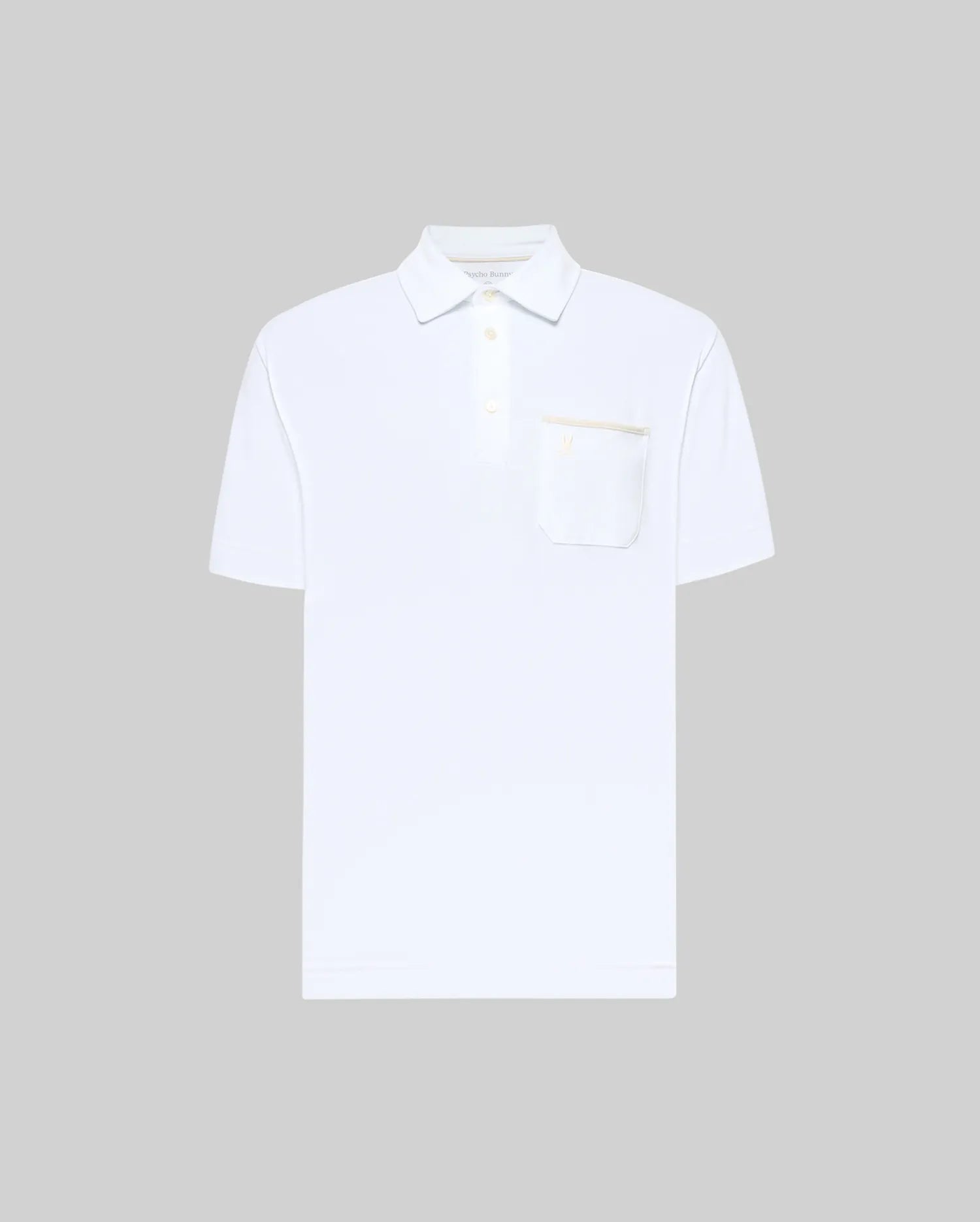 The Psycho Bunny MENS HADLEY PERFORMANCE PIQUE POLO (MT0100021) is a plain white short-sleeve polo with a collar, three buttons, and a left chest pocket, shown against a light gray background. (5)