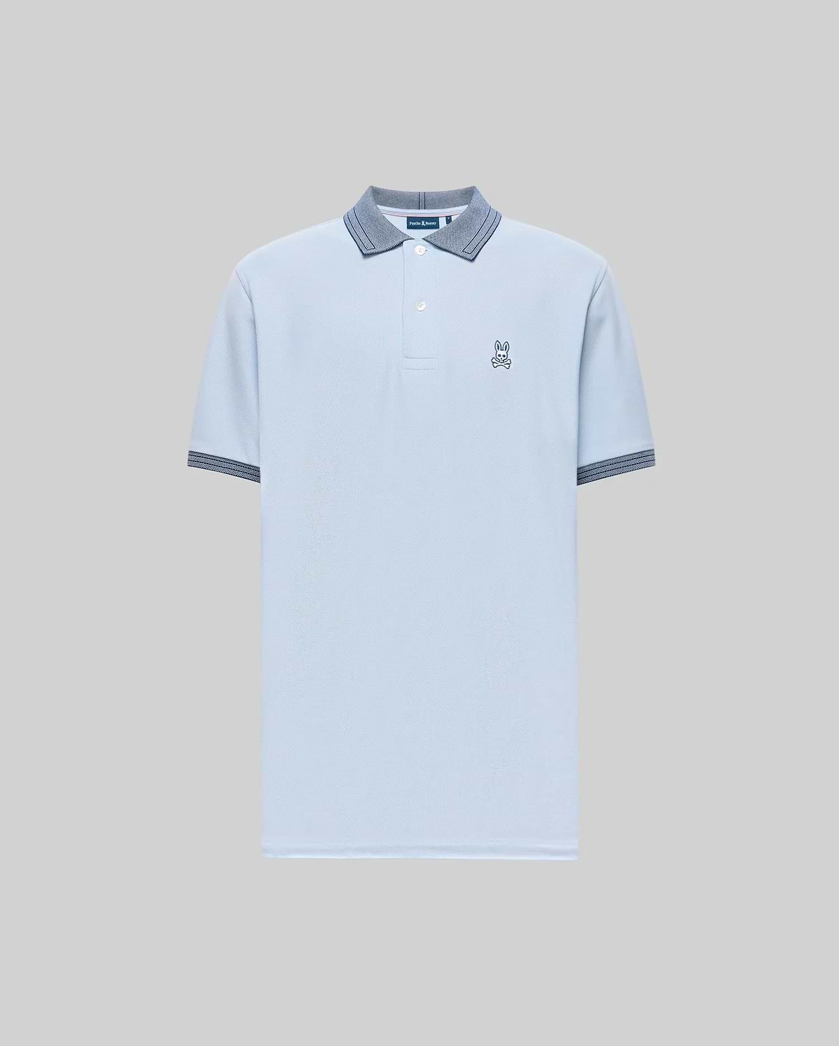 The Psycho Bunny Men's Murphy Pique Polo Shirt (MT0100026) is light blue, crafted from soft Pima cotton, with a buttoned collar, dark blue striped trim on the collar and cuffs, and a small embroidered Bunny logo on the chest. Plain gray background. (5)