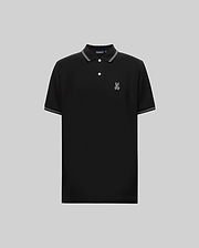The Psycho Bunny MENS HART PIQUE POLO SHIRT (MT0100032) is a black short-sleeve Pima cotton polo with white-trimmed collar and sleeves, button placket, and an embroidered cartoon rabbit logo on the left chest. Shown on a gray background. (5)