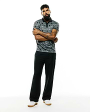 Mens Reeves All Over Bunny Sport Polo, a classic fit black and grey pique polo featuring an all-over white bunny skull pattern and crisp white trim on the collar and sleeves.