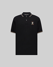 Mens Ara Pique Polo, black classic fit with white and orange striped ribbed collar and cuffs, featuring a vibrant embroidered multicolored Psycho Bunny skull and crossbones logo on the left chest.