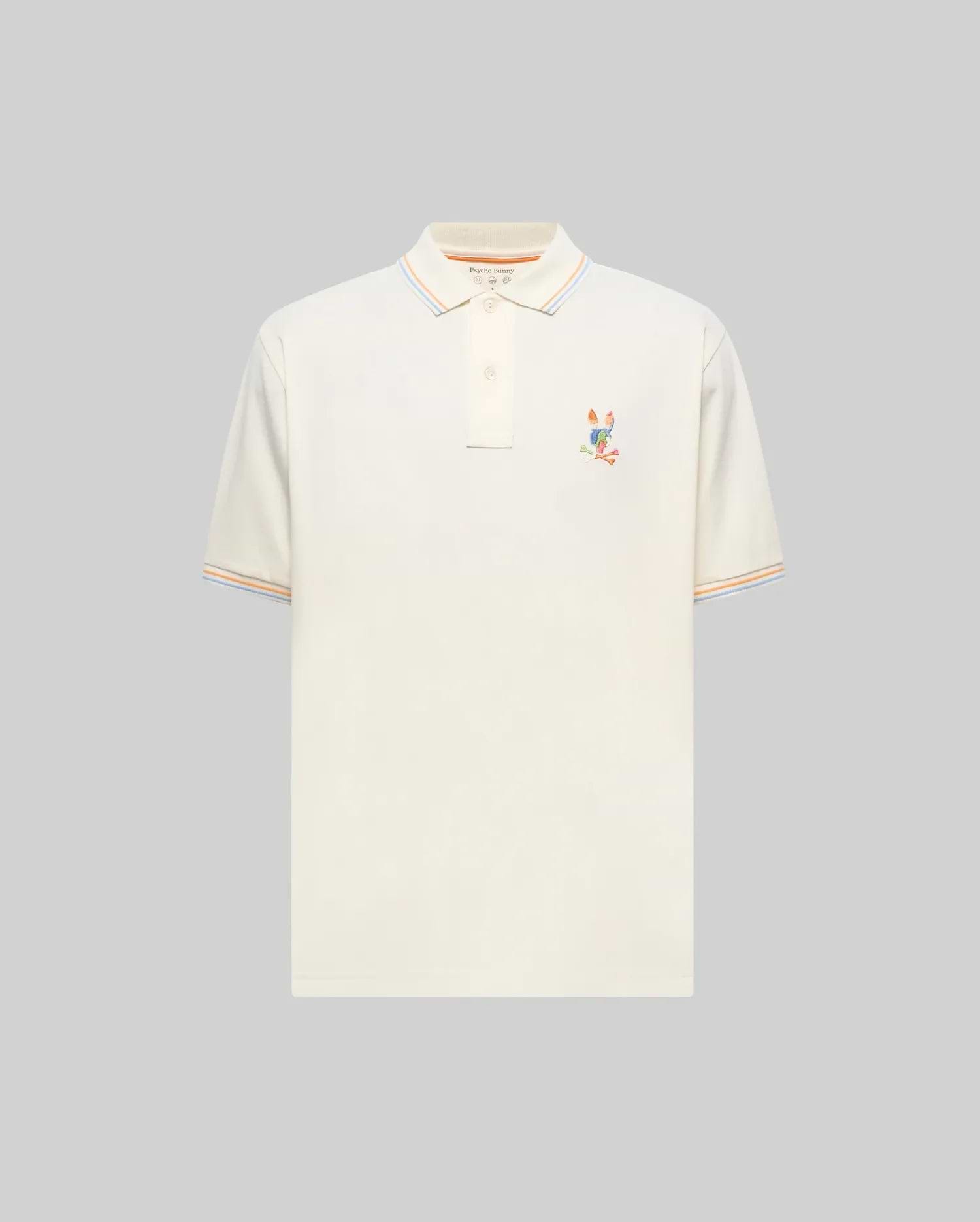 Mens Ara Pique Polo, a classic fit cream pique polo featuring a vibrant multi-color embroidered Psycho Bunny skull logo on the left chest, with orange, light blue, and white striped collar and sleeve cuffs. (4)
