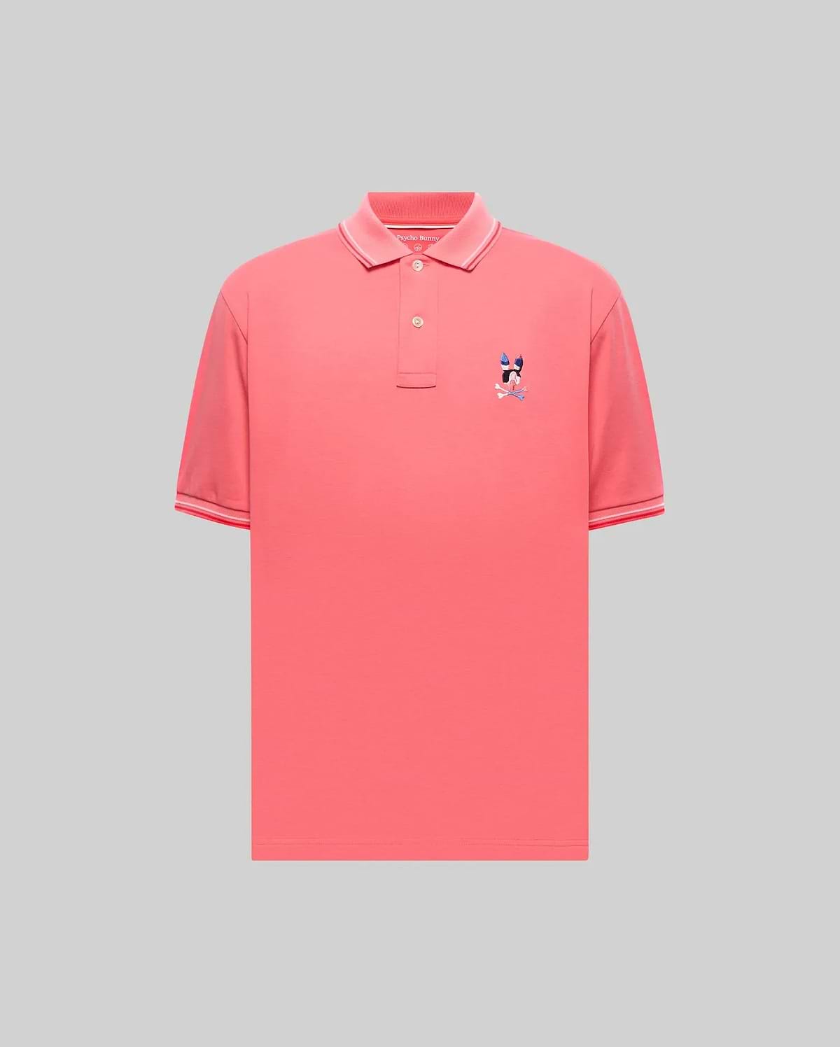 Mens Ara Pique Polo in vibrant coral pique, featuring a classic fit, ribbed collar and cuffs with white and red tipping, and a small embroidered multi-color Psycho Bunny skull logo on the left chest. (5)