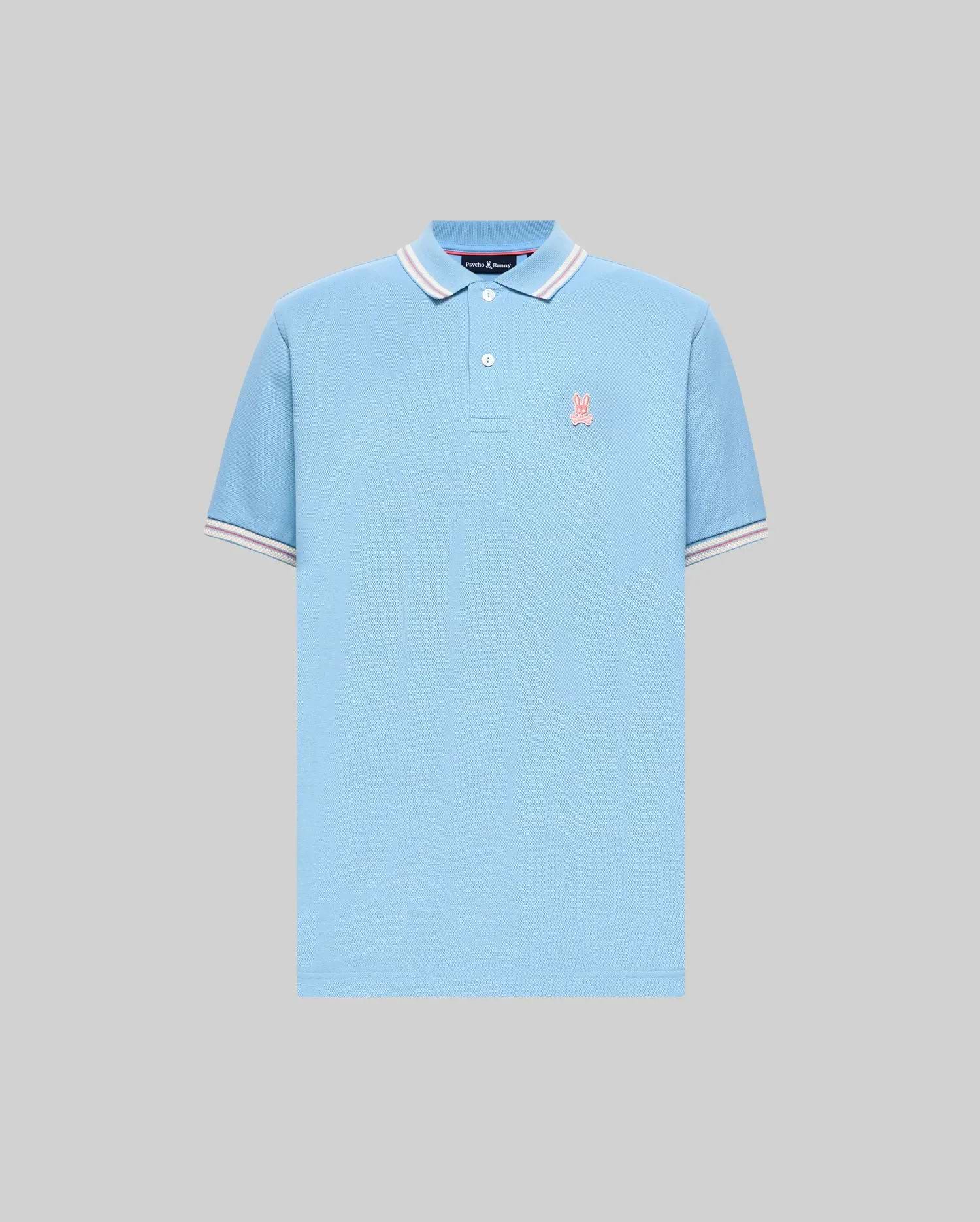 Mens Clark Pique Polo, light blue classic fit pique knit with ribbed collar and cuffs featuring white and pink tipping, and a small pink embroidered Psycho Bunny skull logo on the left chest. (5)