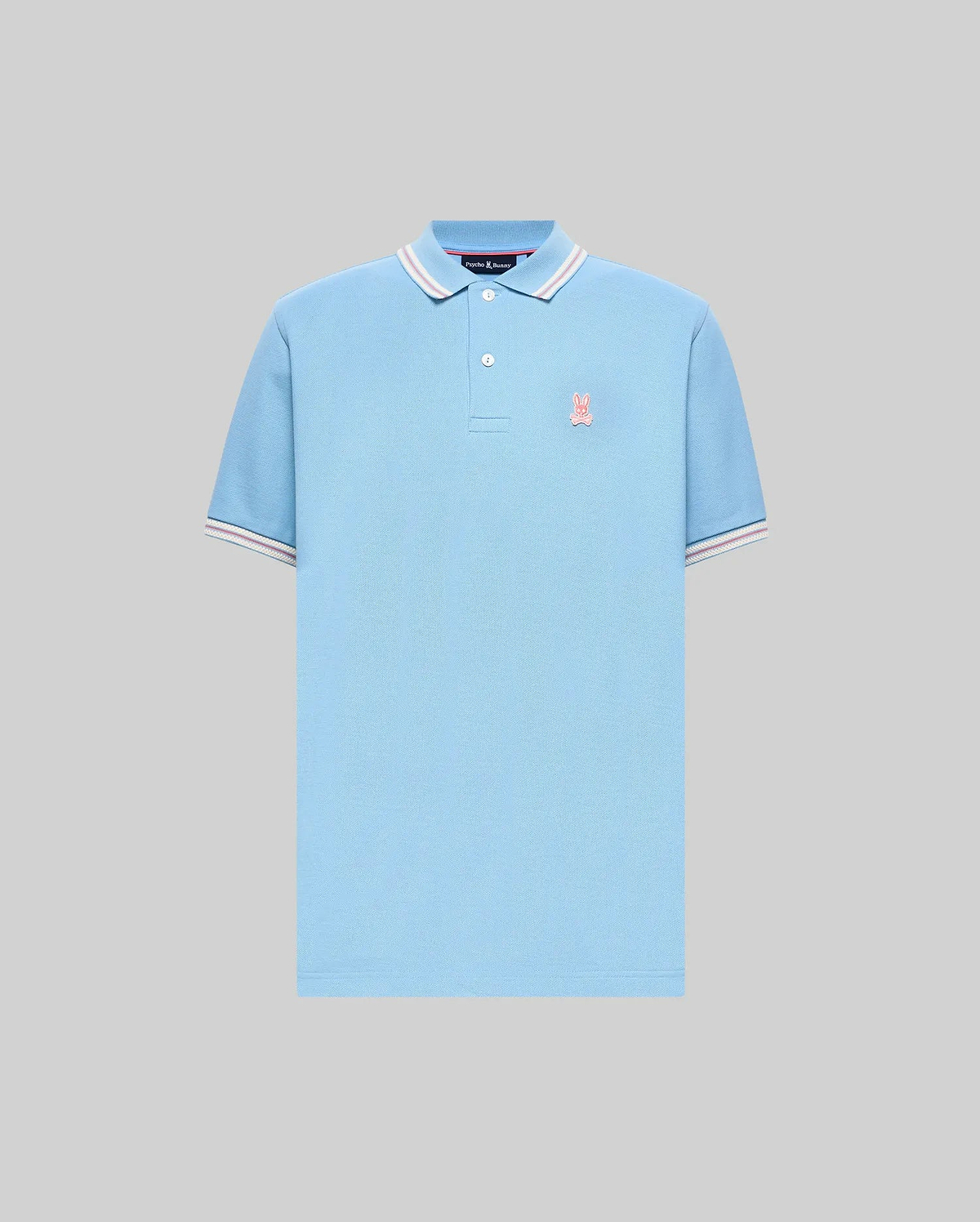 Mens Clark Pique Polo, light blue classic fit pique knit with ribbed collar and cuffs featuring white and pink tipping, and a small pink embroidered Psycho Bunny skull logo on the left chest. (5)