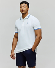 Mens Clark Pique Polo white classic fit pique polo with blue double-striped collar and cuffs, featuring a small embroidered blue Psycho Bunny skull logo on the left chest. (1)