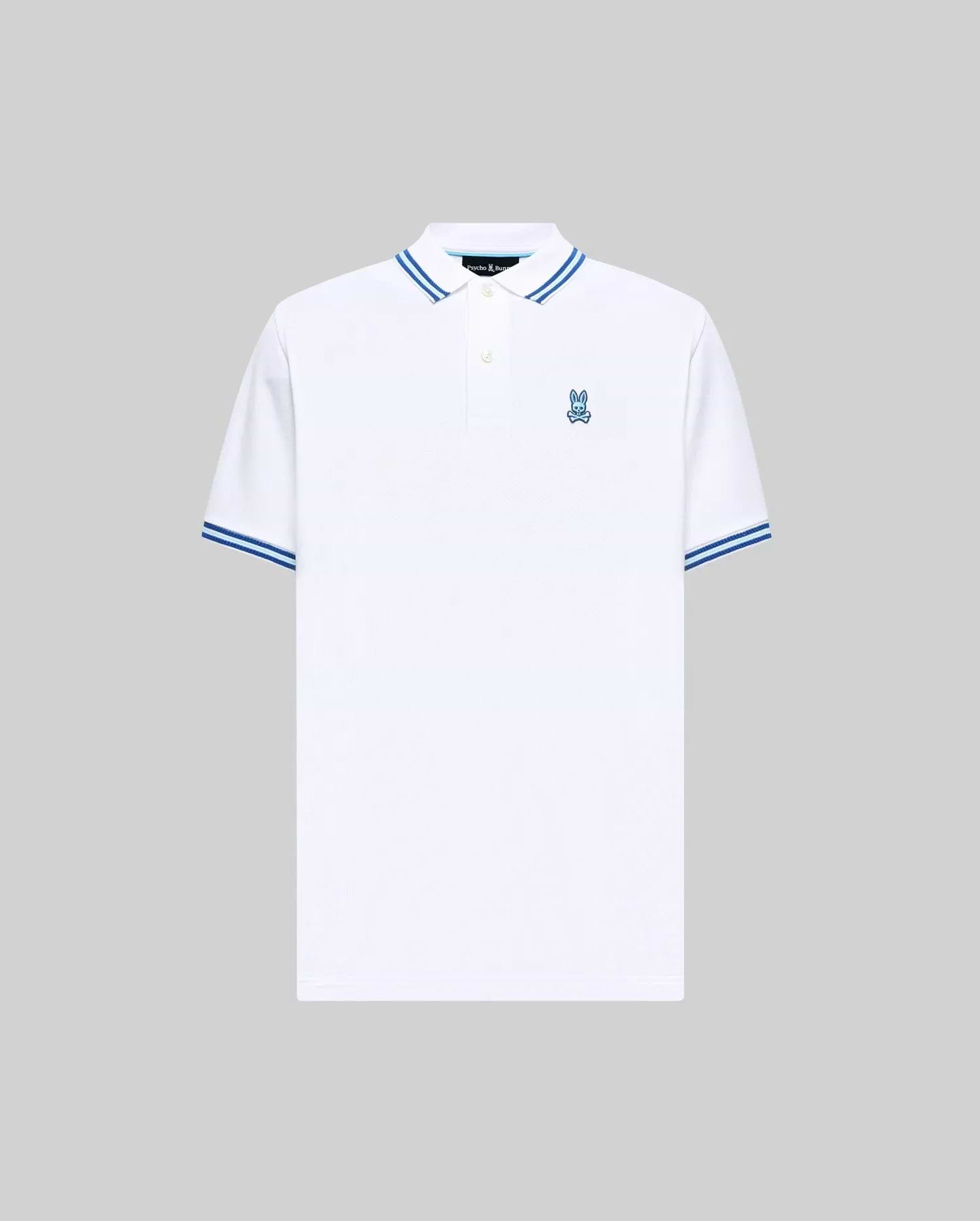 Mens Clark Pique Polo, a classic fit white pique polo with blue striped collar and cuffs, featuring a small blue embroidered Psycho Bunny skull logo on the left chest. (5)