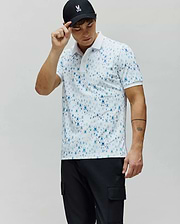 Mens Nev Sport Polo in white jersey knit, featuring an all-over pattern of small blue Psycho Bunny skull logos, with a classic fit and white collar and cuffs.