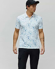 Mens Nev Sport Polo, white premium performance jersey with an all-over gradient blue iconic Psycho Bunny skull logo print, classic fit, white collar and cuffs.