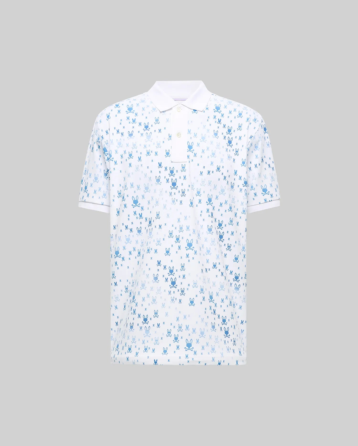 Mens Nev Sport Polo. White pique knit, classic fit polo featuring an all-over blue Psycho Bunny skull logo print, with a crisp white collar, two-button placket, and short ribbed cuffs.