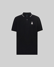 Mens Aram Pique Polo, a classic fit black pique polo with white tipping on the collar and sleeve cuffs, featuring an embroidered white Psycho Bunny skull logo on the left chest. (5)