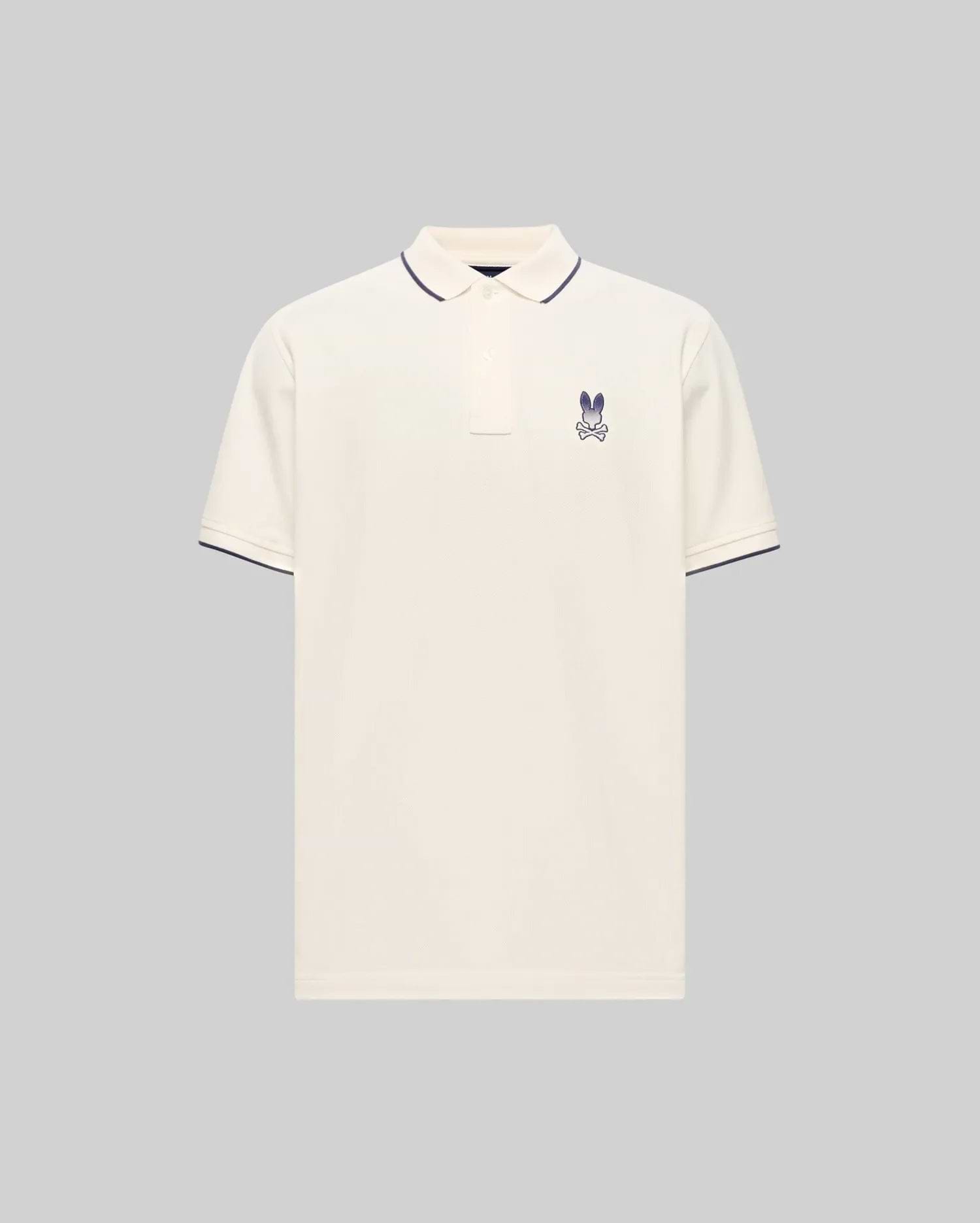 Cream Mens Aram Pique Polo with classic fit, featuring a small embroidered purple Psycho Bunny skull logo on the left chest and navy tipping on the ribbed collar and cuffs. (5)