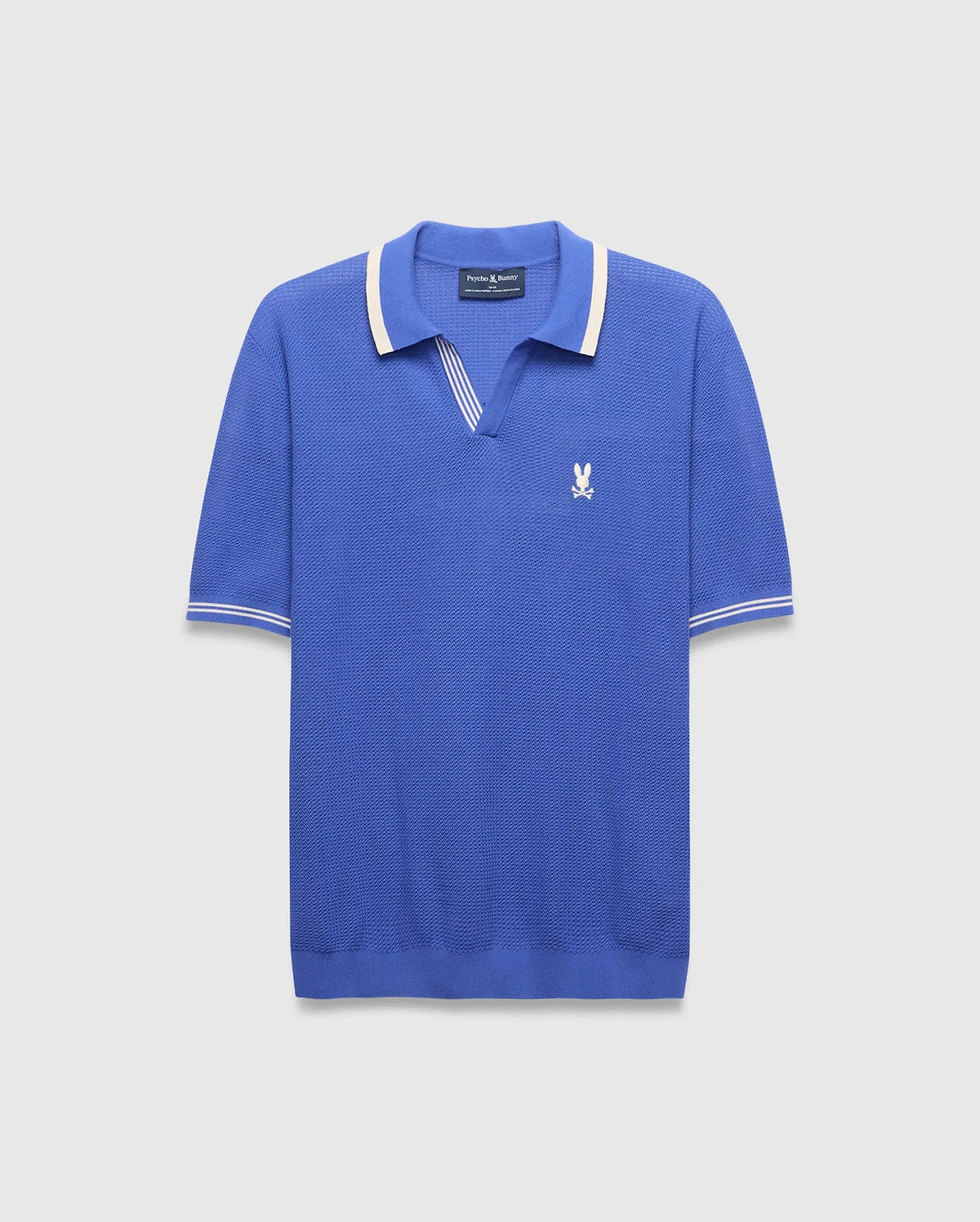 Mens Innis Polo, classic fit, vibrant blue pique knit with cream striped V-neck collar and cuffs, featuring a small embroidered white Psycho Bunny skull logo on the left chest. (5)