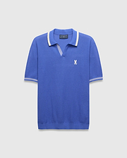 Mens Innis Polo, classic fit, vibrant blue pique knit with cream striped V-neck collar and cuffs, featuring a small embroidered white Psycho Bunny skull logo on the left chest. (5)