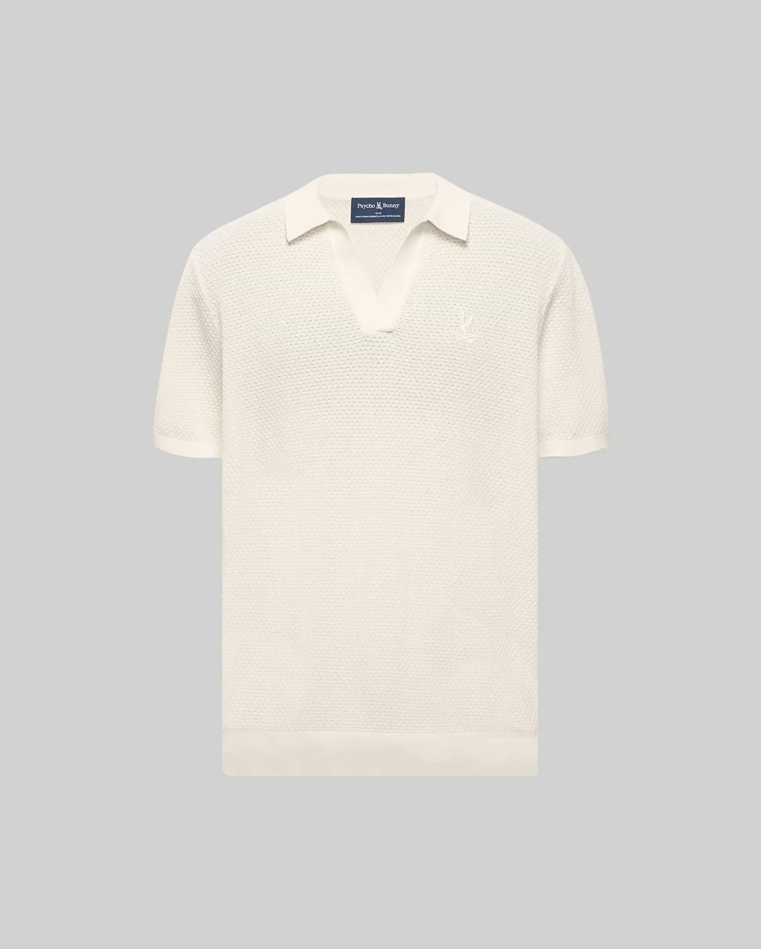 MENS DEVON KNIT POLO in cream, featuring a classic fit, textured knit fabric, open collar, ribbed cuffs and hem, and a small embroidered Psycho Bunny skull logo on the left chest.