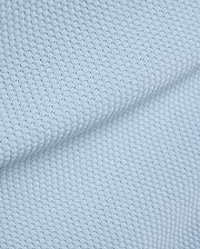 Light blue Mens Devon Bubble Stitch Knit Polo fabric, a premium menswear piece showcasing its unique, refined bubble stitch knit texture, perfect for sophisticated streetwear. (7)