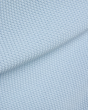 Light blue Mens Devon Bubble Stitch Knit Polo fabric, a premium menswear piece showcasing its unique, refined bubble stitch knit texture, perfect for sophisticated streetwear. (7)