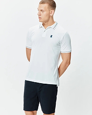 Mens Edwin Sport Polo, a classic fit white performance jersey polo with navy tipping on the collar and sleeve cuffs, featuring a small embroidered navy Psycho Bunny skull logo on the left chest.