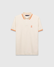 Mens Holden Pique Polo, a classic fit cream pique polo with orange and tan striped collar and cuffs, featuring a small embroidered orange Psycho Bunny skull logo on the left chest. (5)