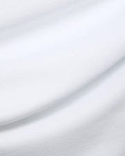 Mens Duncan Pique Polo in crisp white, a premium classic fit polo crafted from finely textured pique knit fabric, embodying Psycho Bunny's refined streetwear aesthetic.